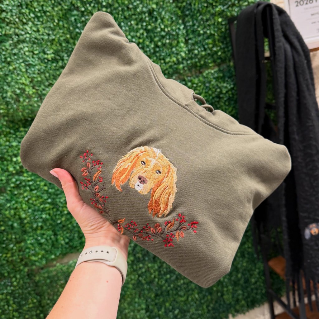 Olive hoodie embroidered with a spaniel portrait and autumn branches